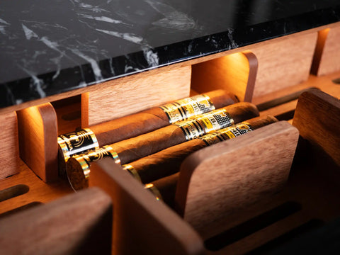 LED-lit interior of a Litolite Diamond Large humidor with precision wood shelving keeping cigars evenly humidified